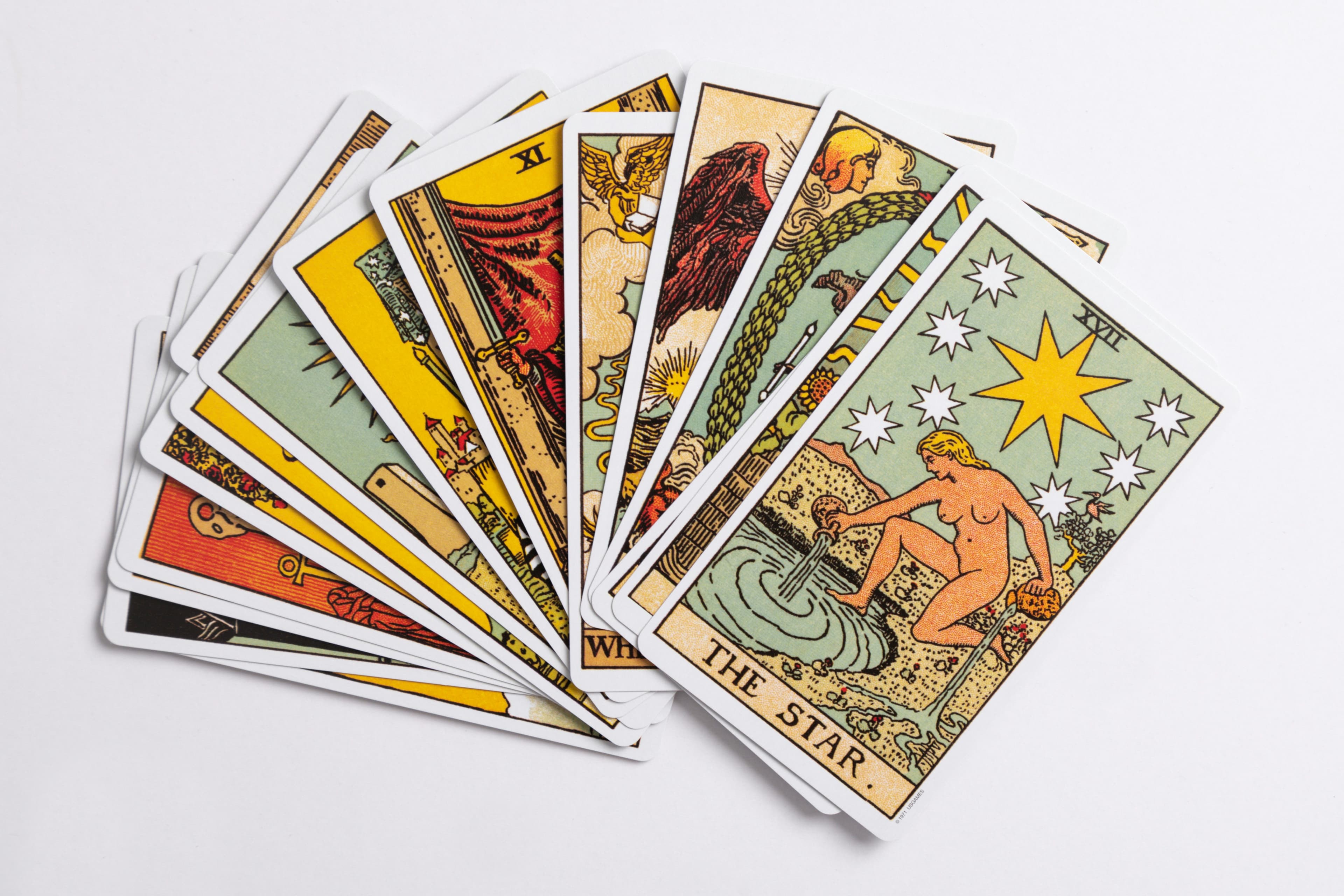 A hand of tarot cards fanned out